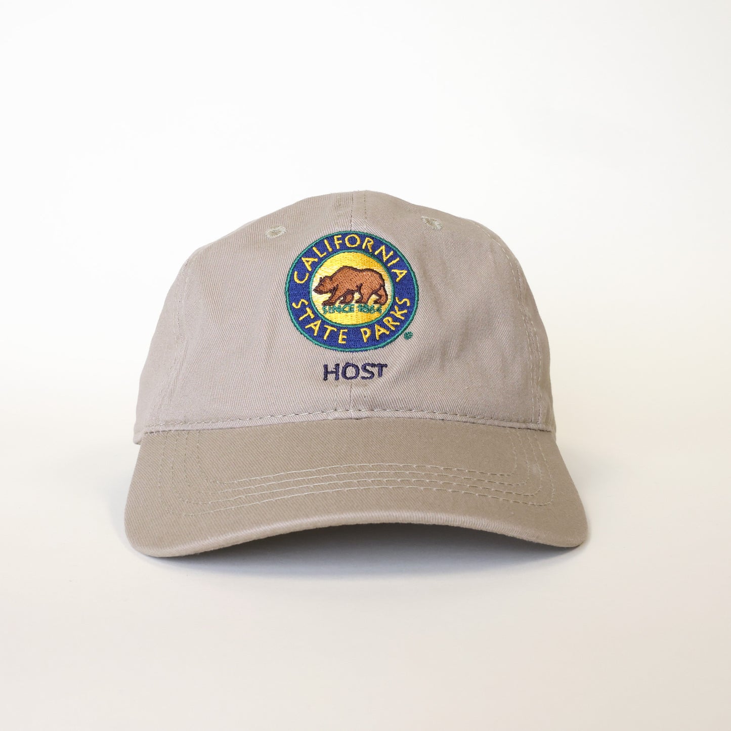 a tan colored baseball hat that says Host and has the California State Parks logo
