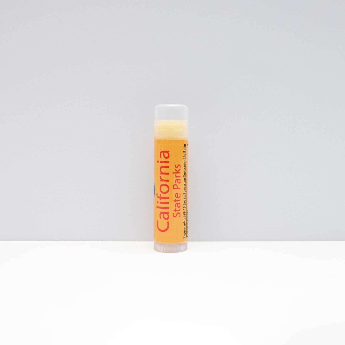 a yellow tube of lip balm with the words California State Parks