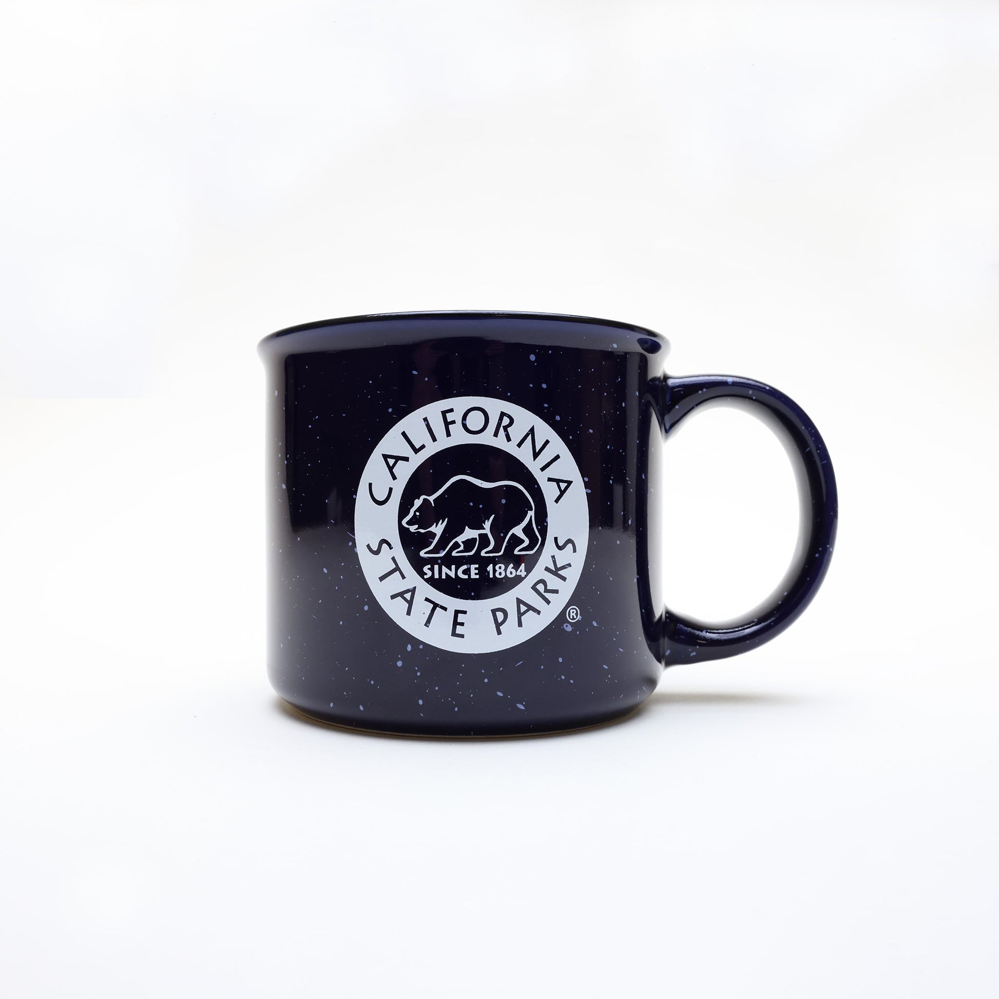 a navy blue campfire style mug with white speckles and a California State Parks logo