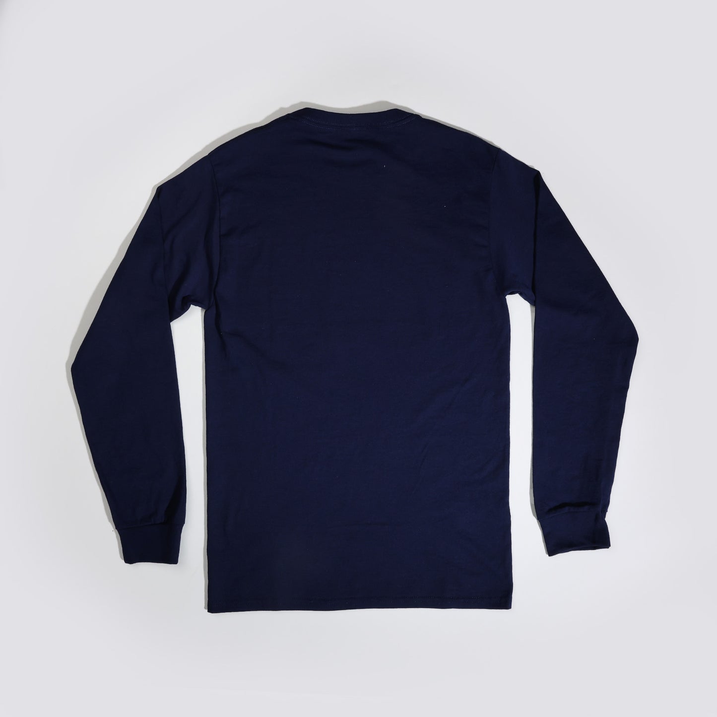 the back of the long sleeve, navy blue t-shirt