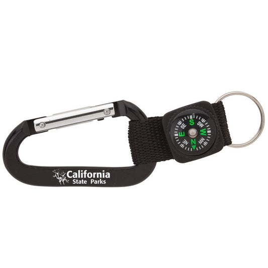 a small compass attached to a black carabiner