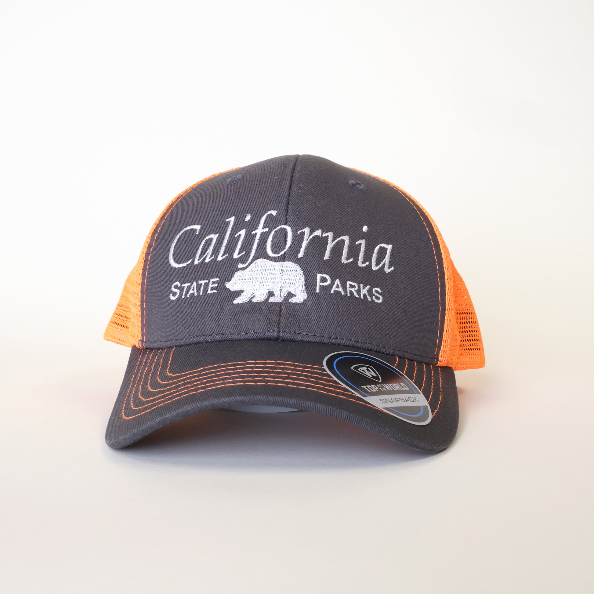 a grey trucker hat with bright orange mesh and the words California State Parks